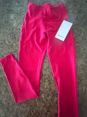 lululemon Wunder Train HR Tight 28” w/ Pockets Bright Pink Leggings